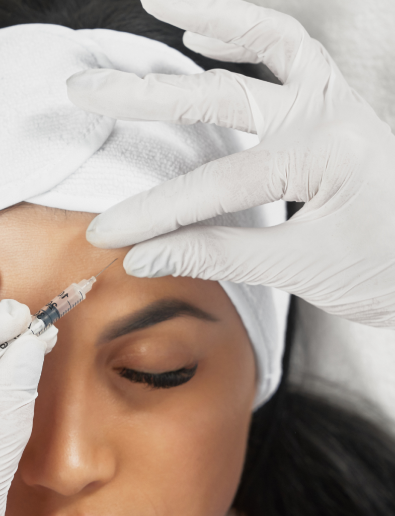 Women getting botox in forehead